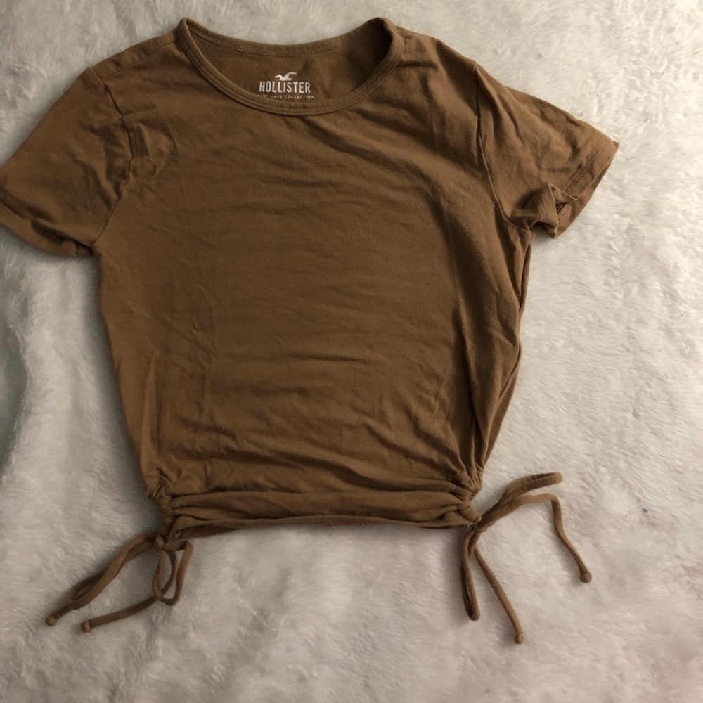 Tan/Brown Hollister baby Tee with side ties.